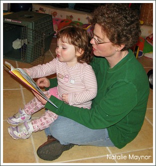 mum reading with baby