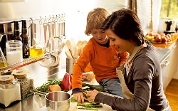 child helping cook