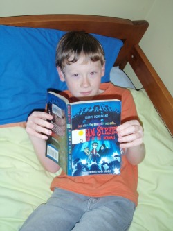 Michelle's youngest son reading his latest favourite book.