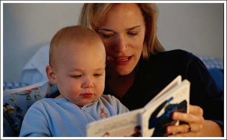 mum reading to baby