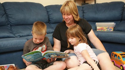 mum reading with children
