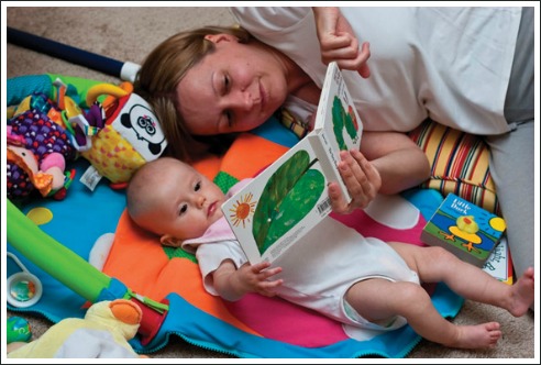 mum reading to baby